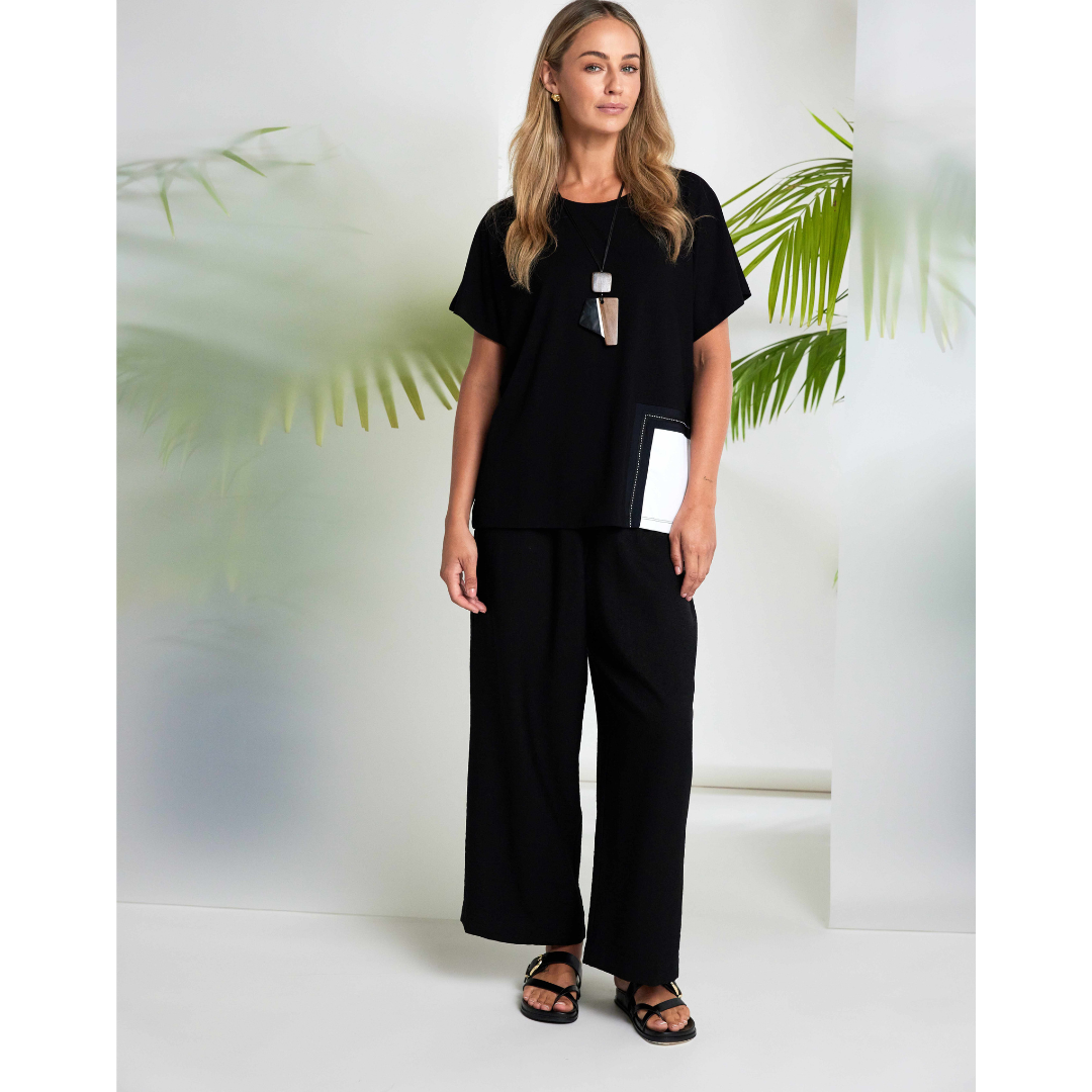 Naya Round Neck Top With Contrast Pocket In Black And White